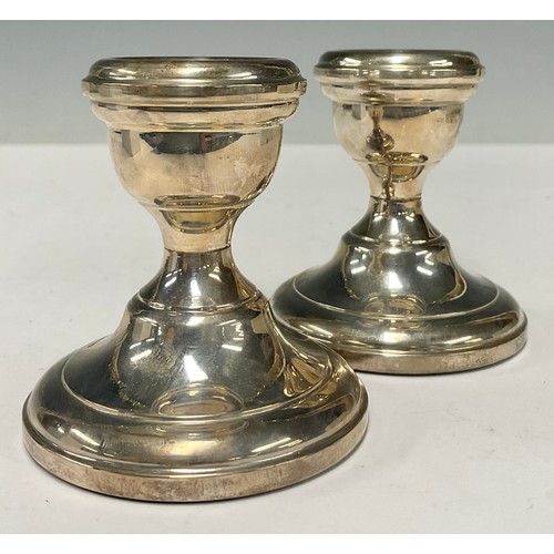 125 - A pair of Elizabeth II silver boudoir candlesticks, Birmingham 1966, boxed