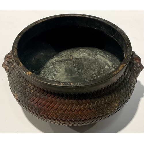 145 - A Chinese bronze censer, lion mask handles, character marks to base, approx. 19cm wide over handles,... 