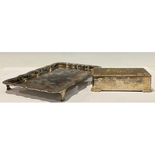 170 - A silver canted rectangular cigarette box, engine turned cover, Celtic border and feet, 17.5cm wide,... 