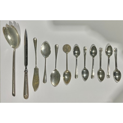 172 - A set of six silver teaspoons, Sheffield 1931; a pair of silver fruit spoons, Sheffield 1967; a silv... 