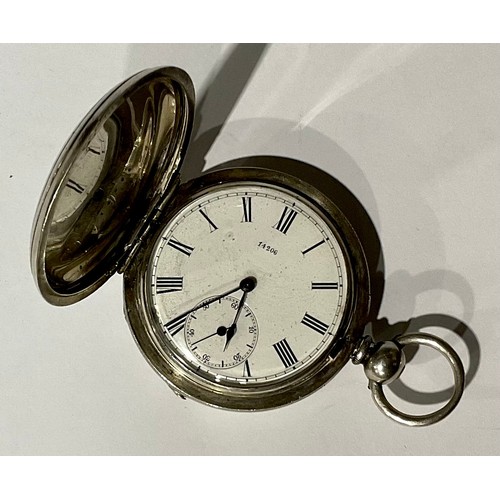 186 - A silver hunter pocket watch, Roman numerals on white dial, subsidiary seconds dial, the case marked... 