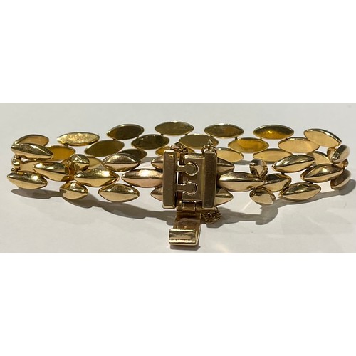 197 - An Italian 9ct gold UnoAerre fancy link bracelet, marked 375, safety chain attached, 15.9g