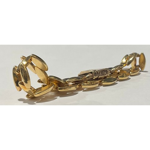 197 - An Italian 9ct gold UnoAerre fancy link bracelet, marked 375, safety chain attached, 15.9g