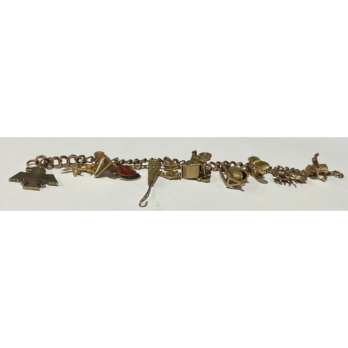 199 - A 9ct rose gold curb link charm bracelet, suspended with eleven 9ct gold charms including baby's cra... 