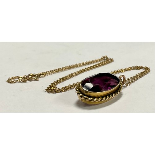 213 - A 9ct gold mounted amethyst pendant, 6.9g, boxed