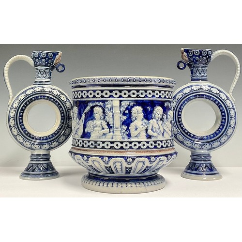 223 - A pair of German Simon Peter Gerz Westerwald stoneware salt glazed moon flask type ewers, glazed in ... 