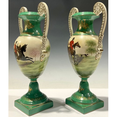 226 - A pair of large twin handled porcelain vases, decorated with hunting scenes on a green ground, picke... 