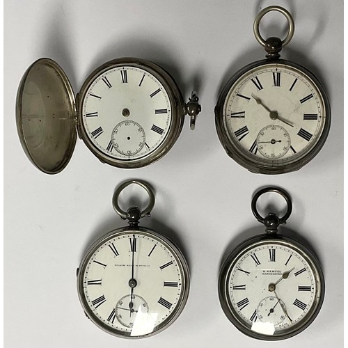 235 - A silver Elgin pocket watch, white enamel dial, machine turned case with vacant cartouche; others (4... 