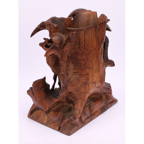 240 - A Black Forest vase, carved as a deer beside a tree stump, 21cm high, c.1870