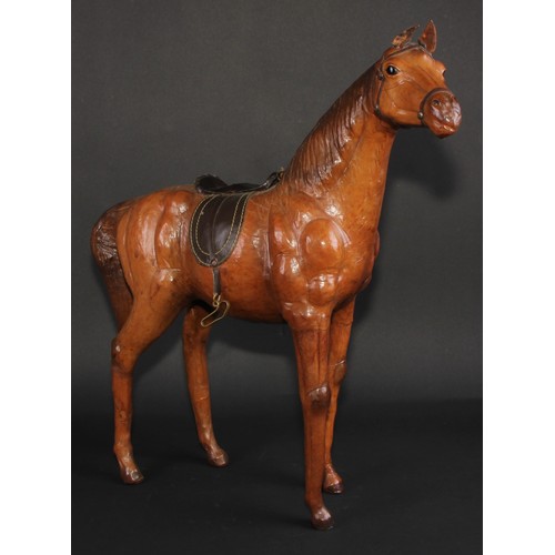 3336 - A mid-20th century leather-wrapped model, of a horse, in the manner of Liberty, 52.5cm high, 48.5cm ... 