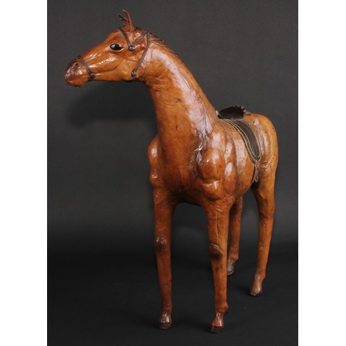 3336 - A mid-20th century leather-wrapped model, of a horse, in the manner of Liberty, 52.5cm high, 48.5cm ... 