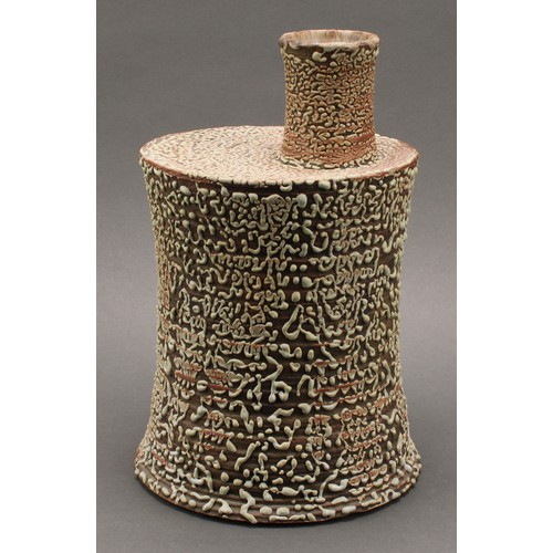 3192 - Studio Pottery - a chimney vase, by Andrew Palin, wriggle worked in green glaze on a brown ground, 3... 