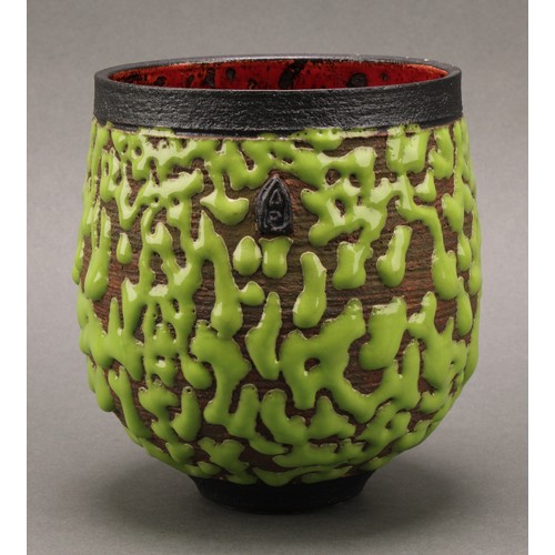 3209 - Studio Pottery - an ovoid vase, by Andrew Palin, wriggle worked in green glaze on a brown ground, th... 