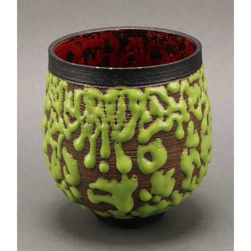 3209 - Studio Pottery - an ovoid vase, by Andrew Palin, wriggle worked in green glaze on a brown ground, th... 