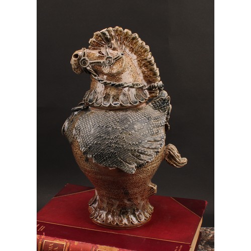 3198 - Studio Pottery - a salt glazed stoneware Unicorn vase and cover, by Jennie Hale, in mottled shades o... 