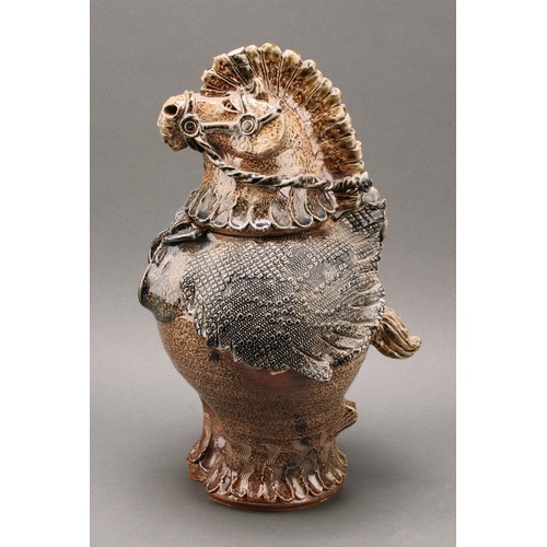 3198 - Studio Pottery - a salt glazed stoneware Unicorn vase and cover, by Jennie Hale, in mottled shades o... 