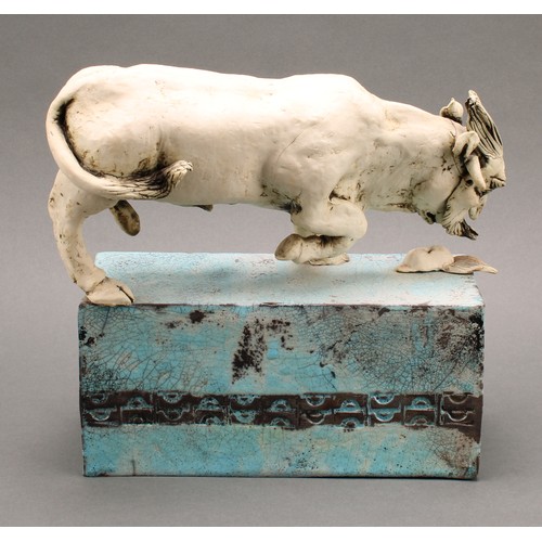 3194 - Studio Pottery - a model of a bull in grotesque mask mauling an infant mask, by Jan Lewis Eccleston,... 