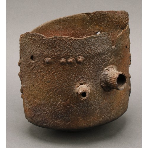 3199 - Studio Pottery - a salt glazed stoneware vase, by Peter Clough, resembling a riveted rusty receptacl... 