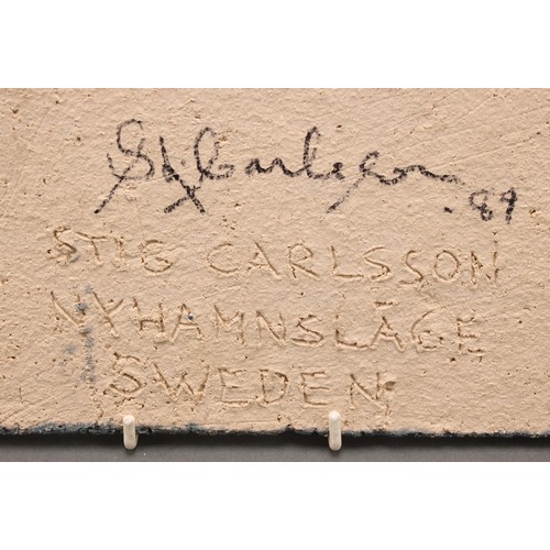 3202 - Studio Pottery - a stoneware wall plaque, by Stig Carlsson, incised and moulded in low relief with a... 