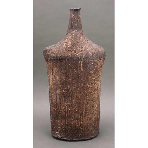 3193 - Studio Pottery - a large stoneware shouldered bottle vase, by Jane Wheeler, glazed in speckled and m... 