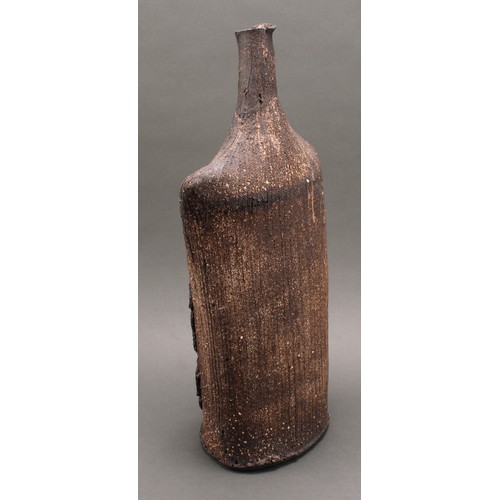 3193 - Studio Pottery - a large stoneware shouldered bottle vase, by Jane Wheeler, glazed in speckled and m... 