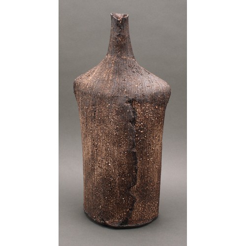 3193 - Studio Pottery - a large stoneware shouldered bottle vase, by Jane Wheeler, glazed in speckled and m... 