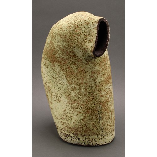 3207 - Studio Pottery - an earthenware vase, monogrammed CB-J, of curved natural form, glazed in textured m... 