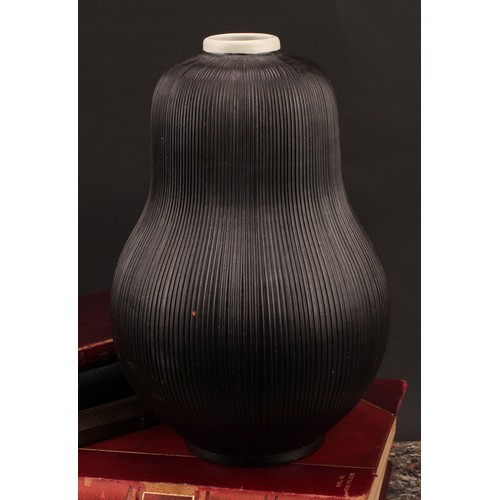 3208 - Studio Pottery - an Ekeby ovoid reeded pear shaped vase, by Sven Erik Skawonius, glazed throughout i... 