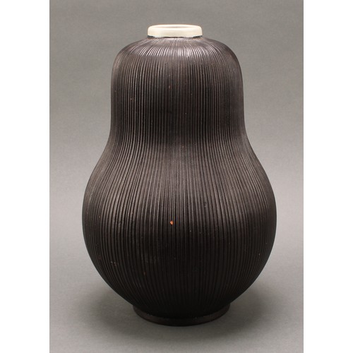 3208 - Studio Pottery - an Ekeby ovoid reeded pear shaped vase, by Sven Erik Skawonius, glazed throughout i... 