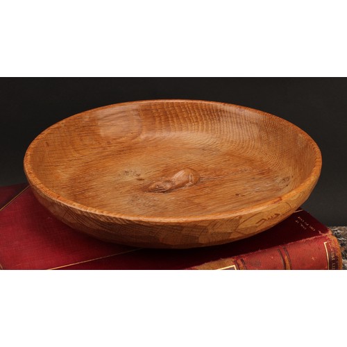 3372 - A Robert Mouseman of Kilburn shallow oak bowl, carved mouse signature to centre, typically adzed thr... 