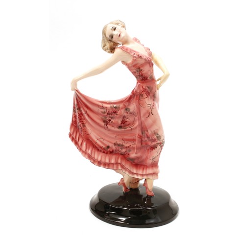 3053 - An Austrian Goldscheider figure, designed by Josef Lorenzl, dancing girl in long pink dress, skirts ... 