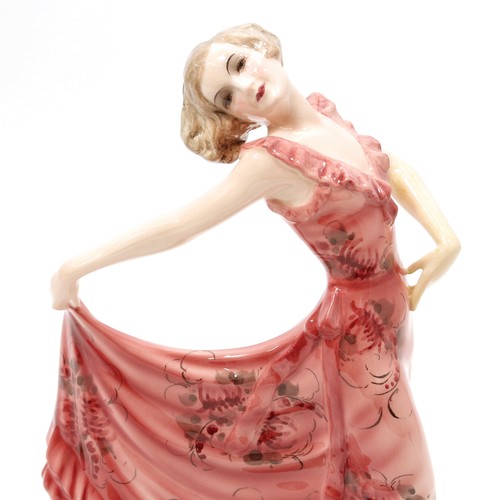 3053 - An Austrian Goldscheider figure, designed by Josef Lorenzl, dancing girl in long pink dress, skirts ... 