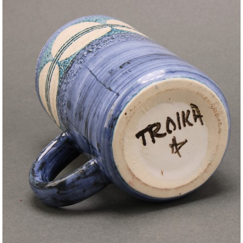 3177 - A Troika cylindrical vase, probably Judith Illsley, 14cm, monogrammed; a Troika mug, by Avril Bennet... 