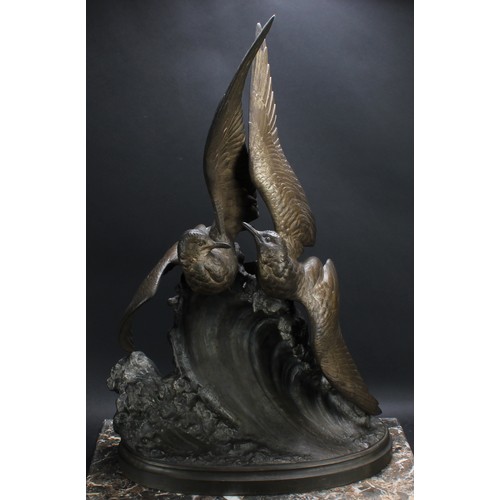 3259 - A large French Spelter model group, after H Le Chesne, pair of gulls on the crest of a foaming wave,... 