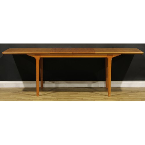 3356 - Mid-century Design - a teak extending dining table, probably A.H McIntosh, Kirkcaldy, two integral a... 