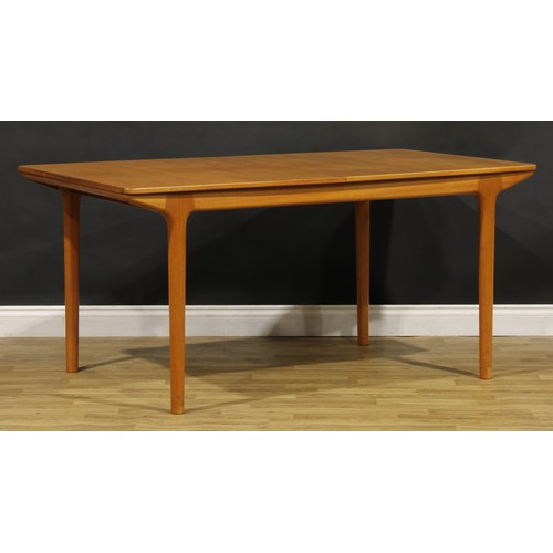 3356 - Mid-century Design - a teak extending dining table, probably A.H McIntosh, Kirkcaldy, two integral a... 