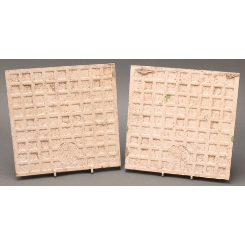 3056 - Wall Tiles - a pair of Maw wall tiles, applied in low relief with sea serpents, celadon glazed, each... 