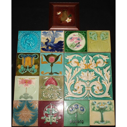 3057 - Wall Tiles - a collection of assorted Art Nouveau majolica tiles, various patterns and colourways, l... 