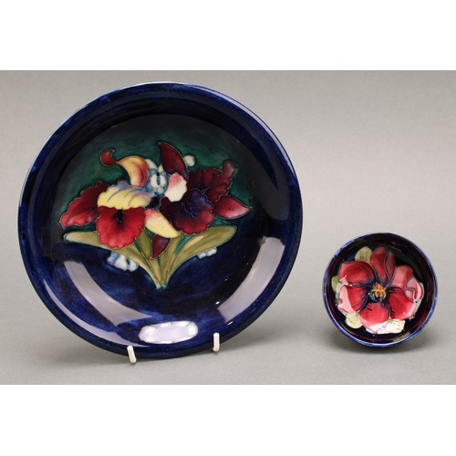 3123 - A Moorcroft Iris pattern plate,18cm diameter; a Moorcroft Anemone pattern trinket dish, 7.5cm diamet... 