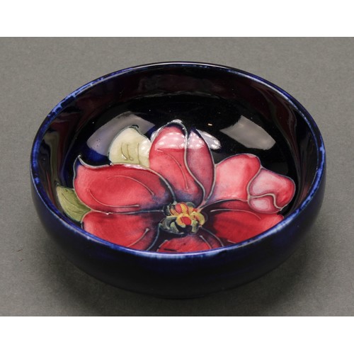 3123 - A Moorcroft Iris pattern plate,18cm diameter; a Moorcroft Anemone pattern trinket dish, 7.5cm diamet... 