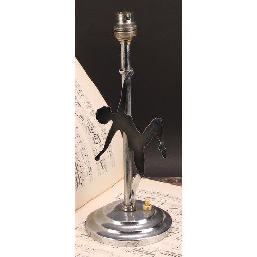 3423 - An Art Deco chrome table lamp, with a female nude dancer, in silhouette, 32cm high, c.1940