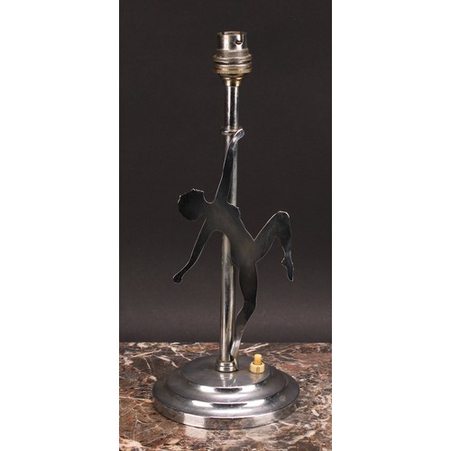 3423 - An Art Deco chrome table lamp, with a female nude dancer, in silhouette, 32cm high, c.1940