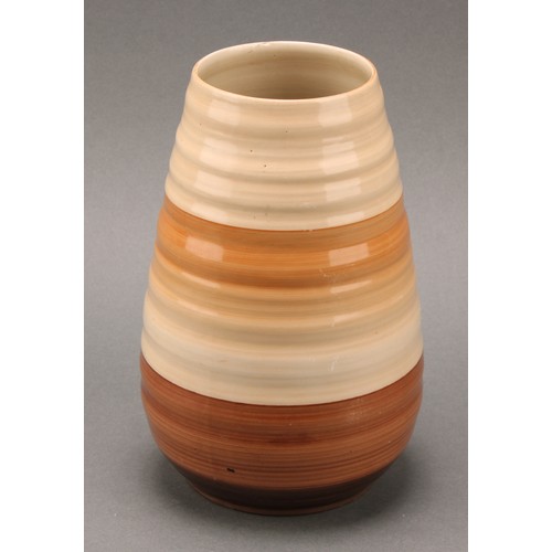 3135 - A pair of Shelley Harmony Art Ware ribbed ovoid vases, painted with bands in tones of brown, 14cm hi... 