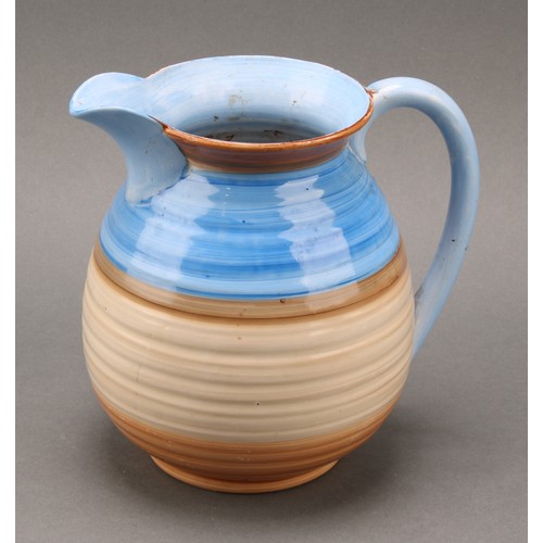 3148 - A Shelley Harmony Art Ware ribbed jug, painted with bands in tones of blue, green and black, 23cm hi... 