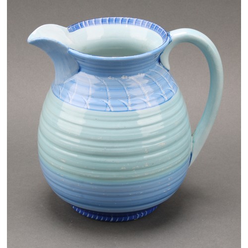 3148 - A Shelley Harmony Art Ware ribbed jug, painted with bands in tones of blue, green and black, 23cm hi... 