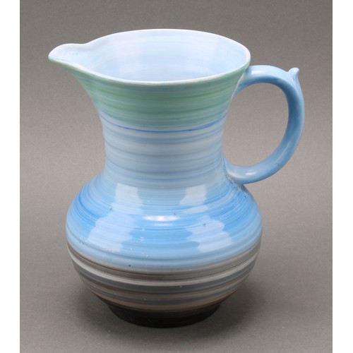 3148 - A Shelley Harmony Art Ware ribbed jug, painted with bands in tones of blue, green and black, 23cm hi... 