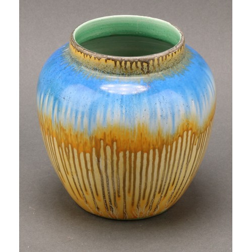 3144 - A Shelley Harmony Art Ware jug, drip glazed in tones of blue, yellow and green, the handle terminati... 