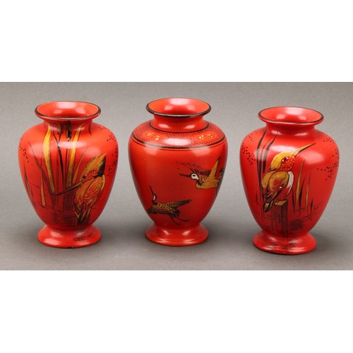 3133 - A pair of Shelley Chinoiserie vases, each in the decorated with cranes on a vermillion ground, 17cm ... 