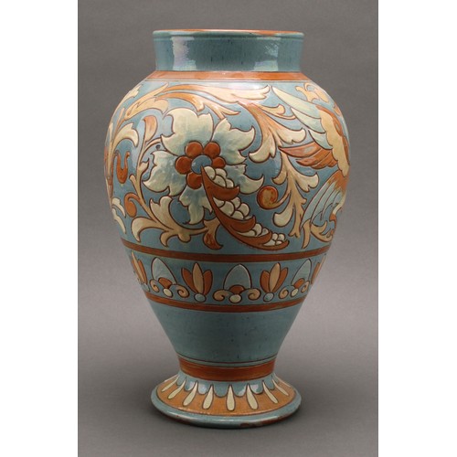 3018 - A CH Brannam Barnstaple inverted baluster vase, sgraffito incised with stylised griffin, 33cm high, ... 