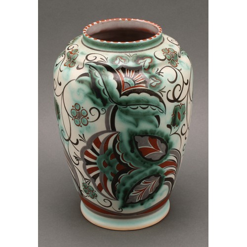 3017 - A Carter Stabler Adams vase, by Anne Hatchard, decorated with stylised flowers, in tones of green an... 